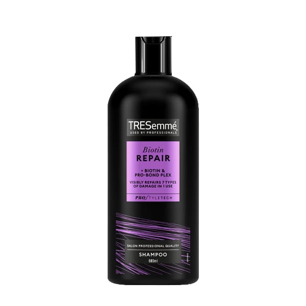 TRESemmé Biotin Repair visibly repairs 7 types of damage in 1 use Shampoo for dry, damaged hair 680 ml